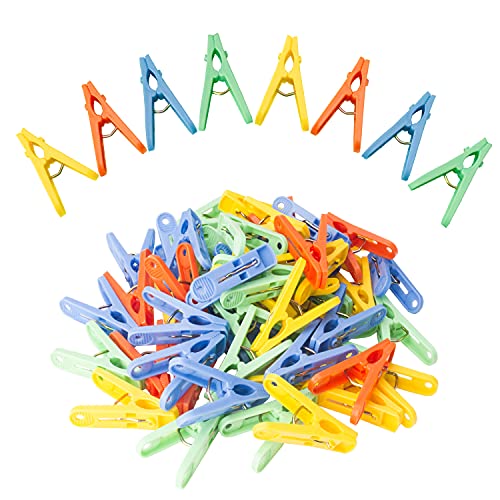 cloth-clips 42 small colored plastic clothespins, 4 bright col